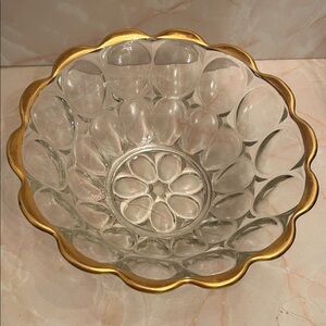 Vintage Jeannette Glass "Thumbprint" pattern bowl with gold trim